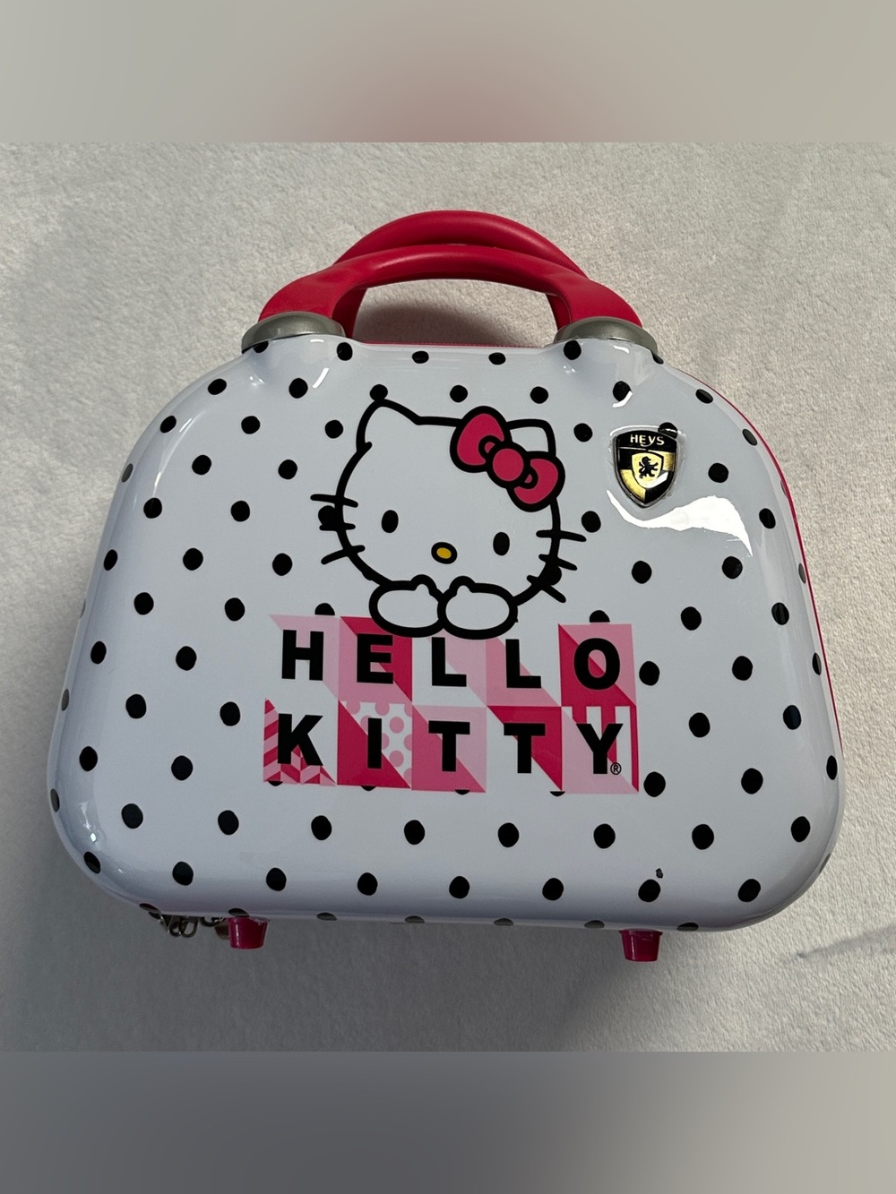 HEYS HELLO KITTY white pink polka dot hardshell full zip mini travel bag